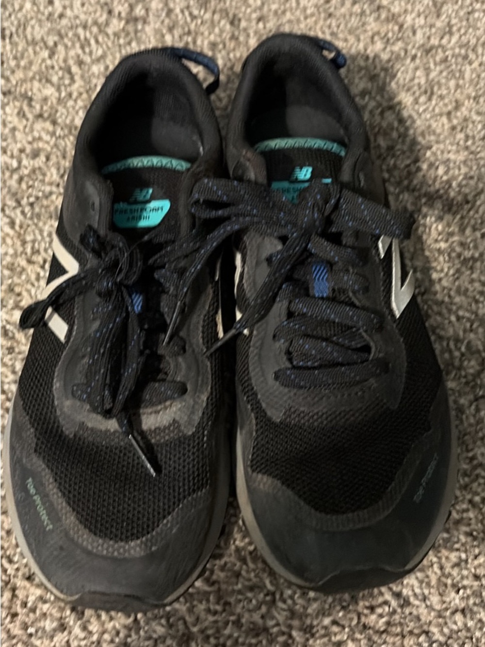 New Balance Women’s Black Athletic Shoes with Teal Accents